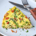 Asparagus Frittata on plate with fork and knife