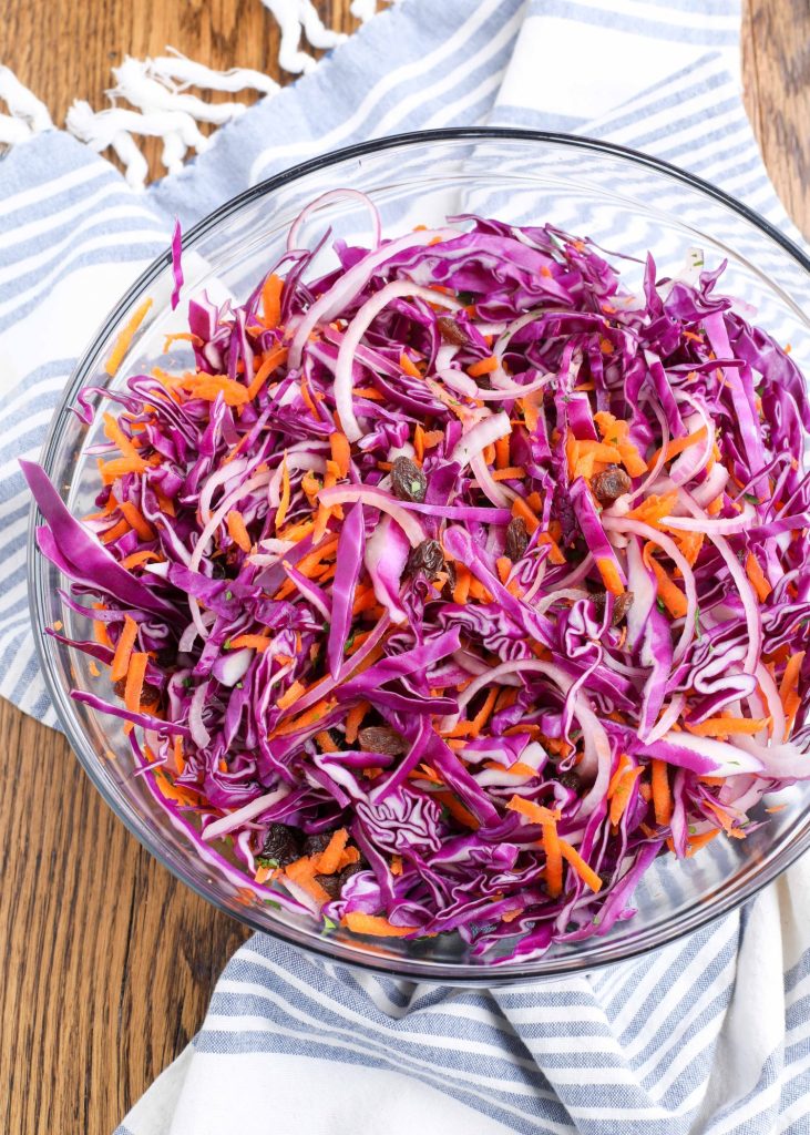 Cabbage Slaw with Raisins, Carrots, and Red Onions