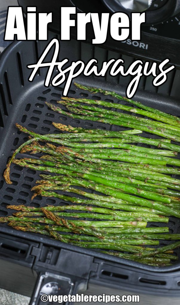 Cooked asparagus in basket of air fryer