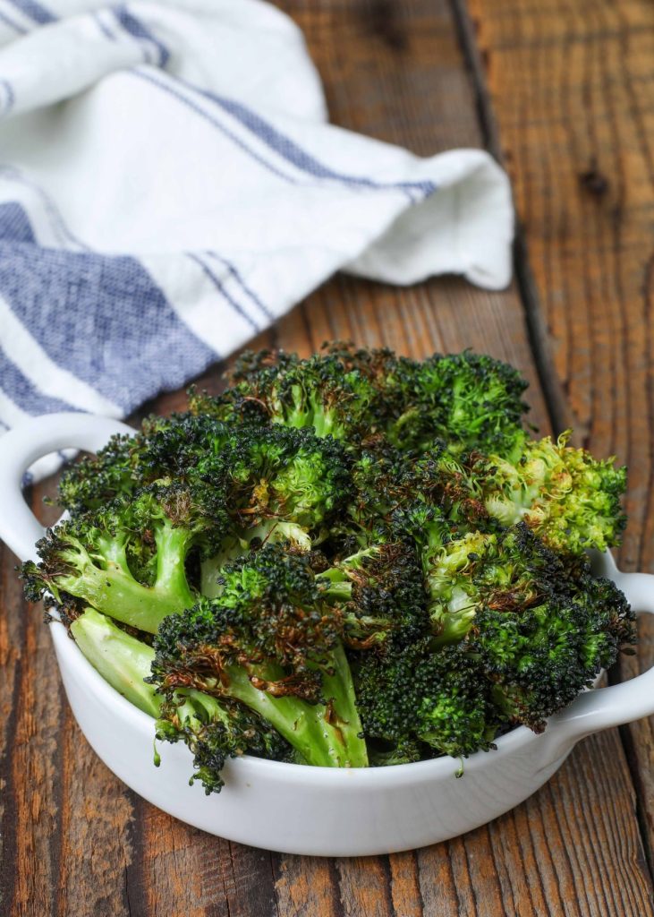 cooked broccoli in white bowl