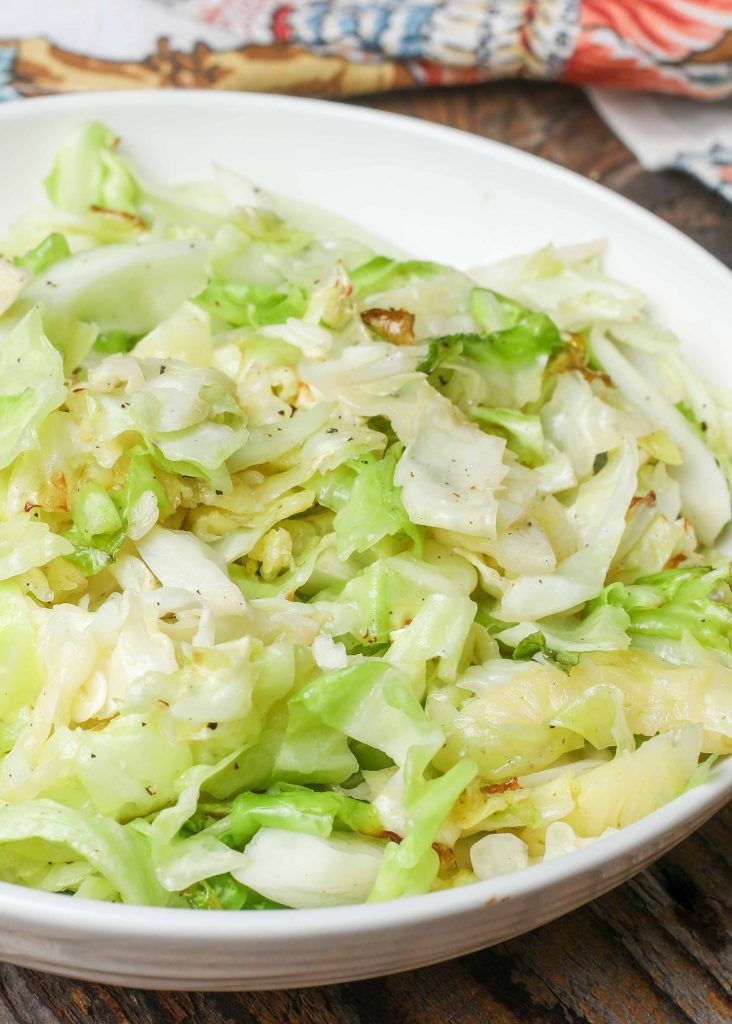 Air Fried Cabbage in white bowl with napkin