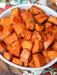 Air Fried Sweet Potatoes in bowl with floral napkin