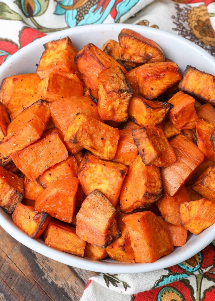 Air Fried Sweet Potatoes in bowl with floral napkin