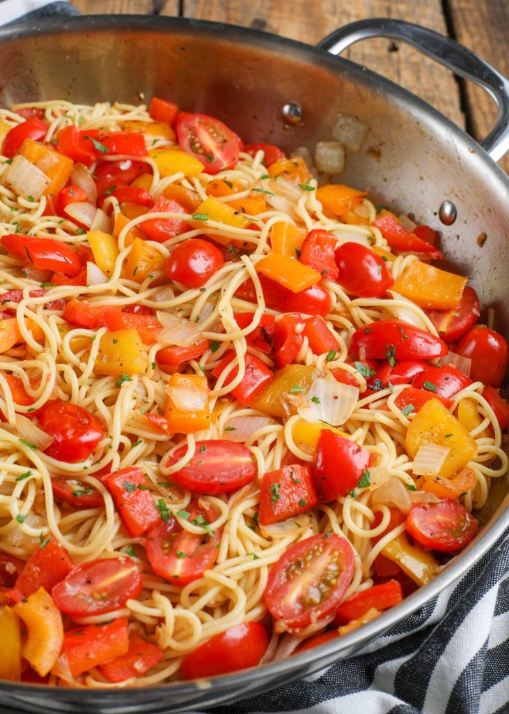 Red Pepper Pasta with tomatoes in skillet