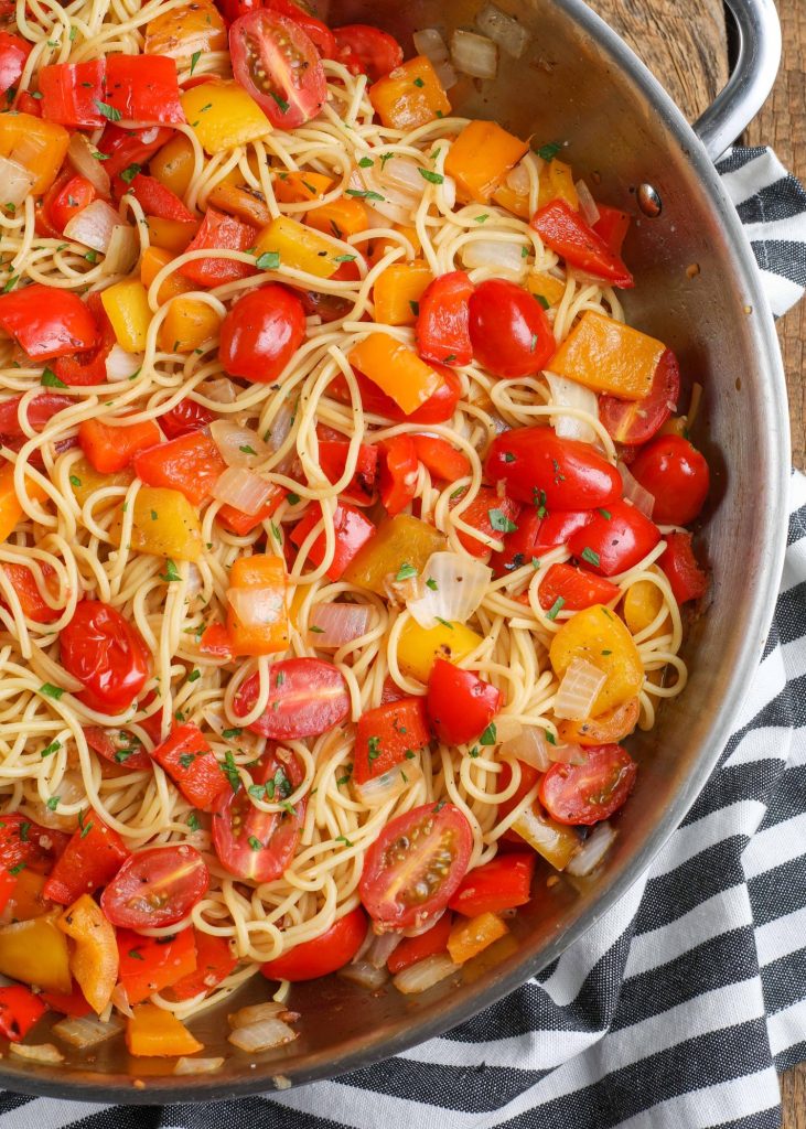 Red Pepper Pasta in pan with striped towel