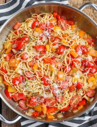 angel hair with peppers and tomatoes in large skillet