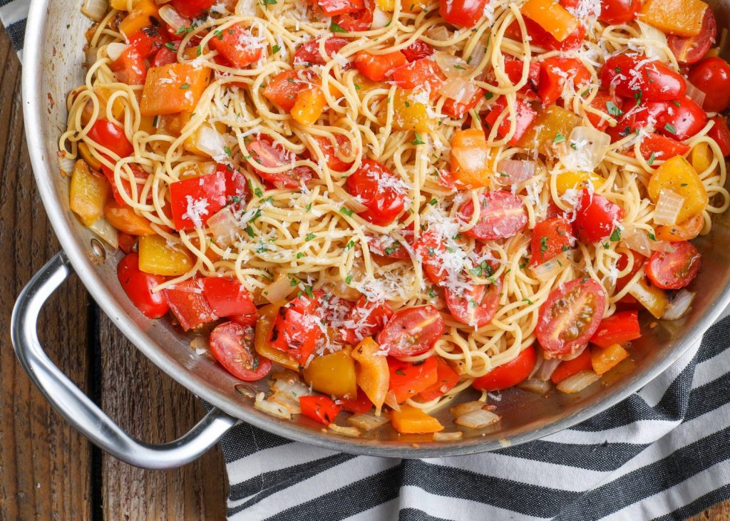 angel hair with peppers in skillet
