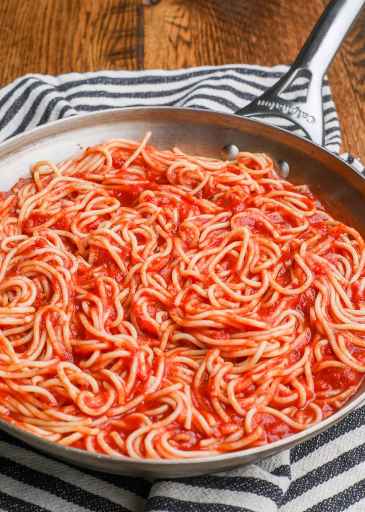 saucy spaghettin noodles in skillet