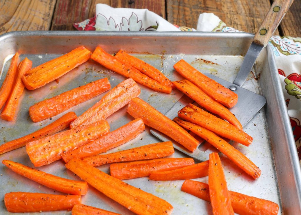 Cooked carrots on tray