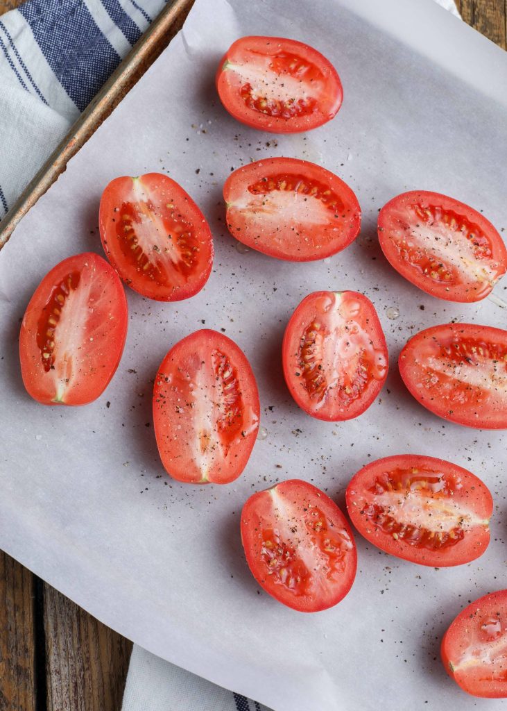 fresh tomatoes on pan