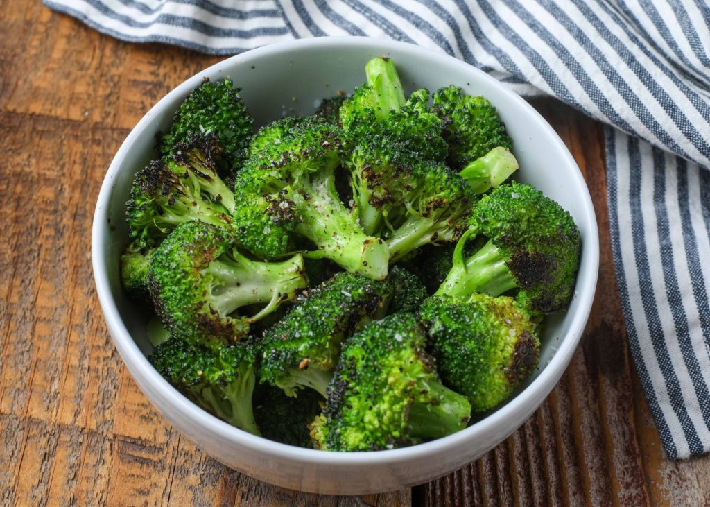 Cooked broccoli in bowl