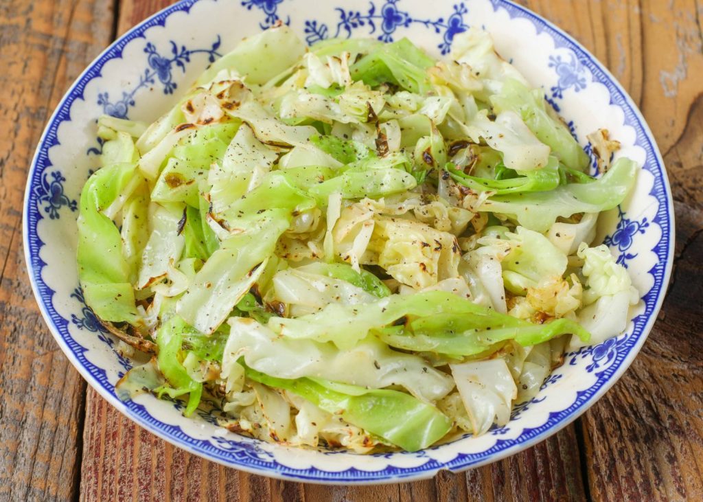 cooked cabbage in vintage bowl