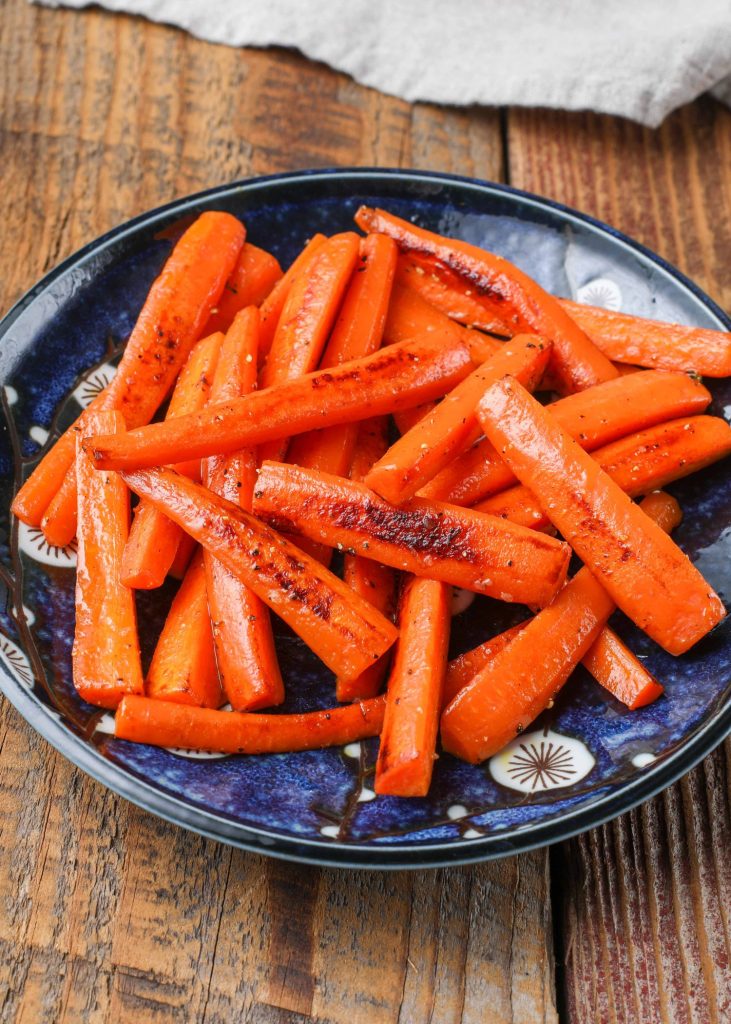 Cooked carrots on plate