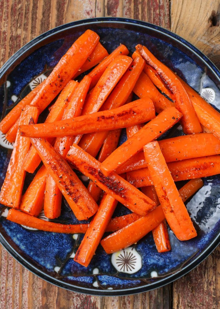 tender crisp cooked carrots on plate