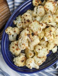 Cooked cauliflower on blue plate