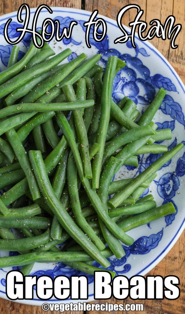 steamed green beans on blue plate