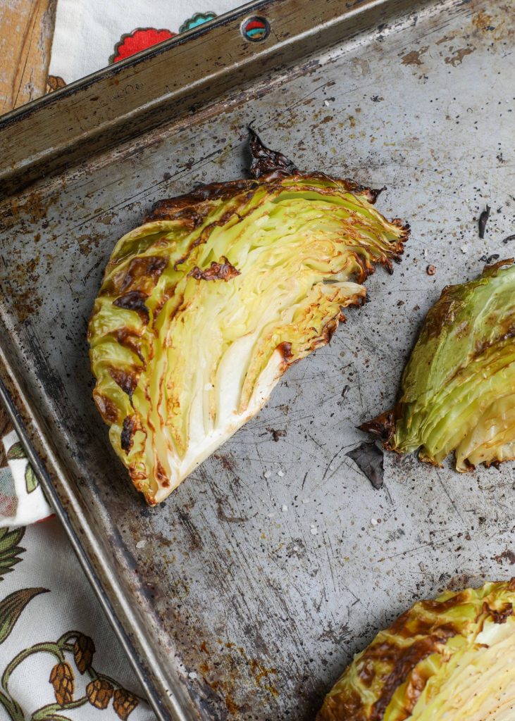 Cooked cabbage on baking sheet