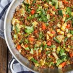 Fried rice with vegetables in giant pan