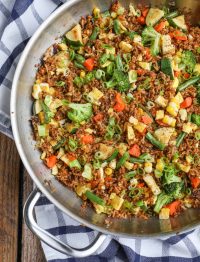 Fried rice with vegetables in giant pan
