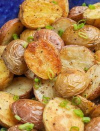 Crispy Oven Roasted Potatoes in blue bowl