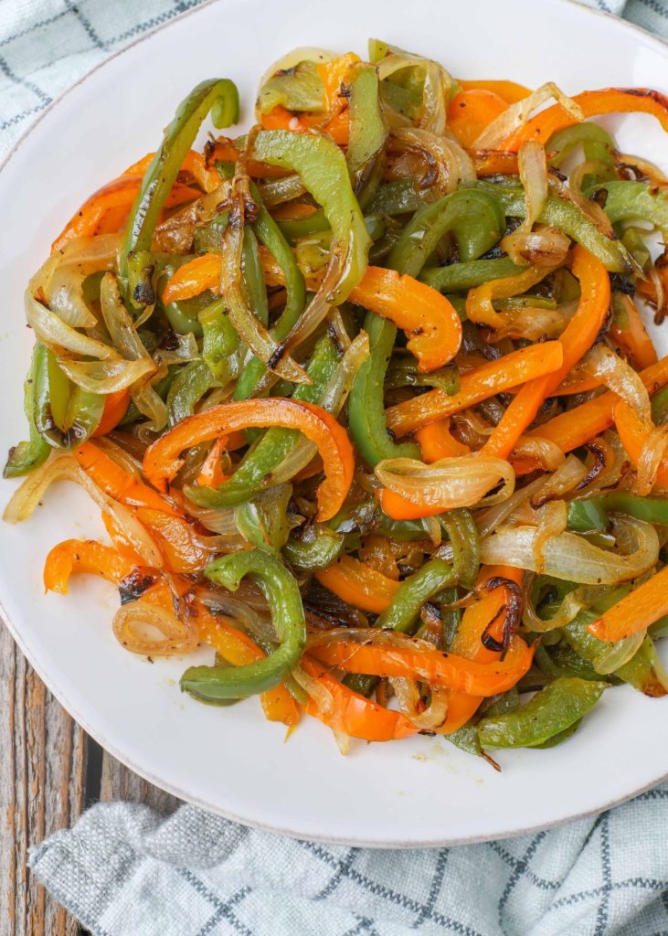 sauteed bell pepper in white dish