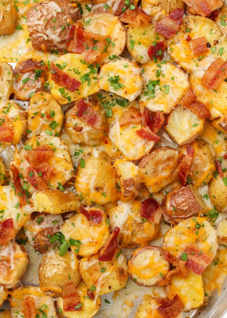 potatoes with cheese and bacon sprinkled with parsley