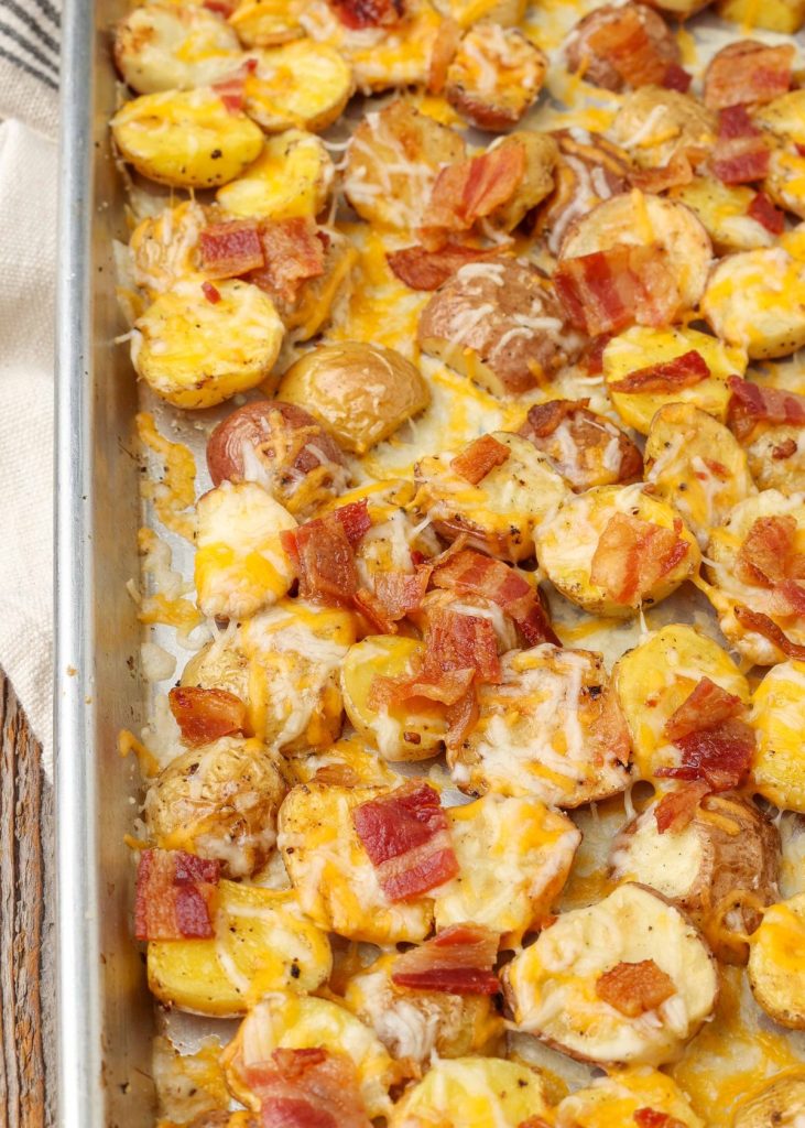 cheese topped potatoes with bacon crumbles