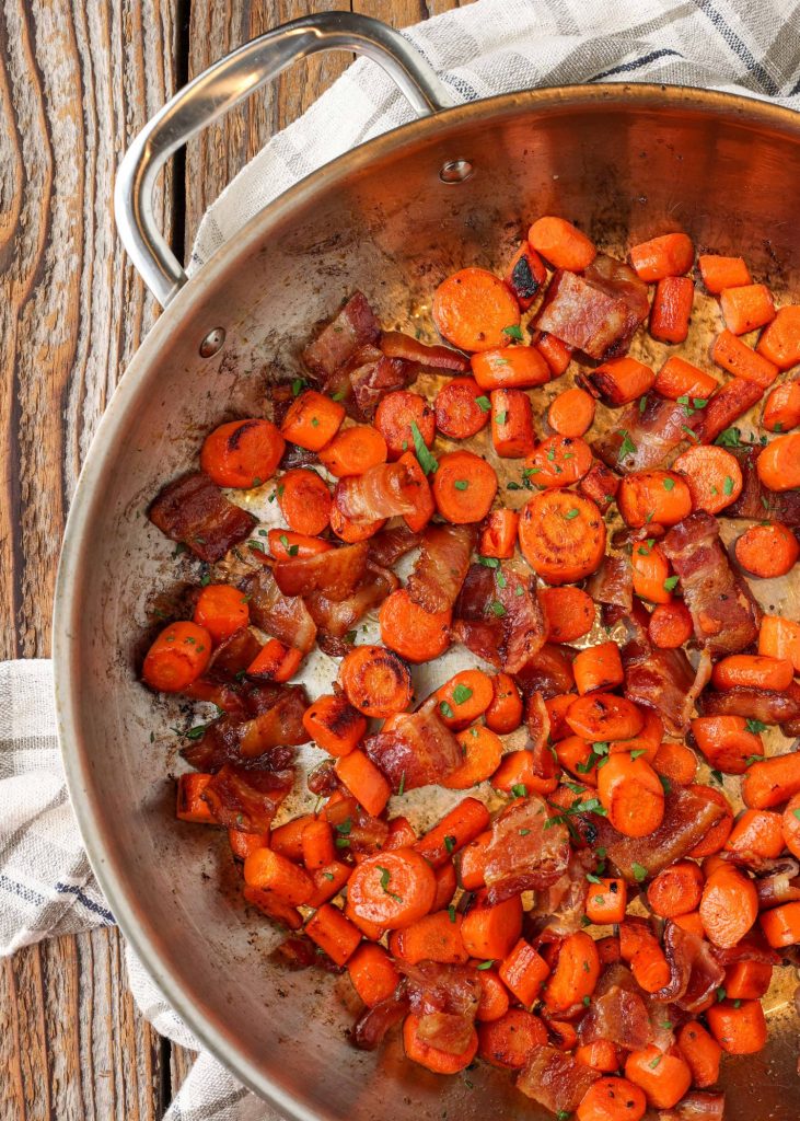 skillet with carrots and bacon