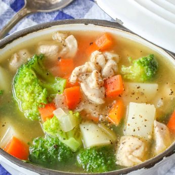 Vegetable Soup with Chicken in white crock with lid