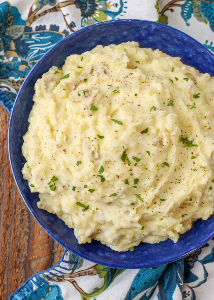 blue bowl filled with mashed potatoes