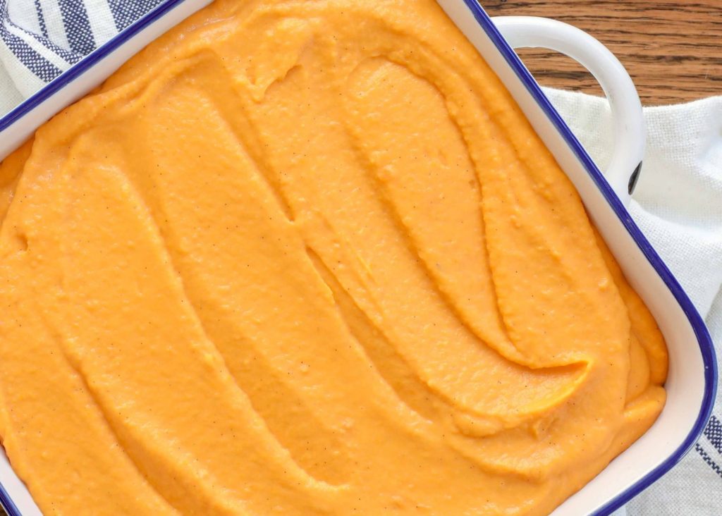 Whipped Sweet Potatoes in Blue rimmed pan