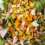 close up of salad with roasted squash