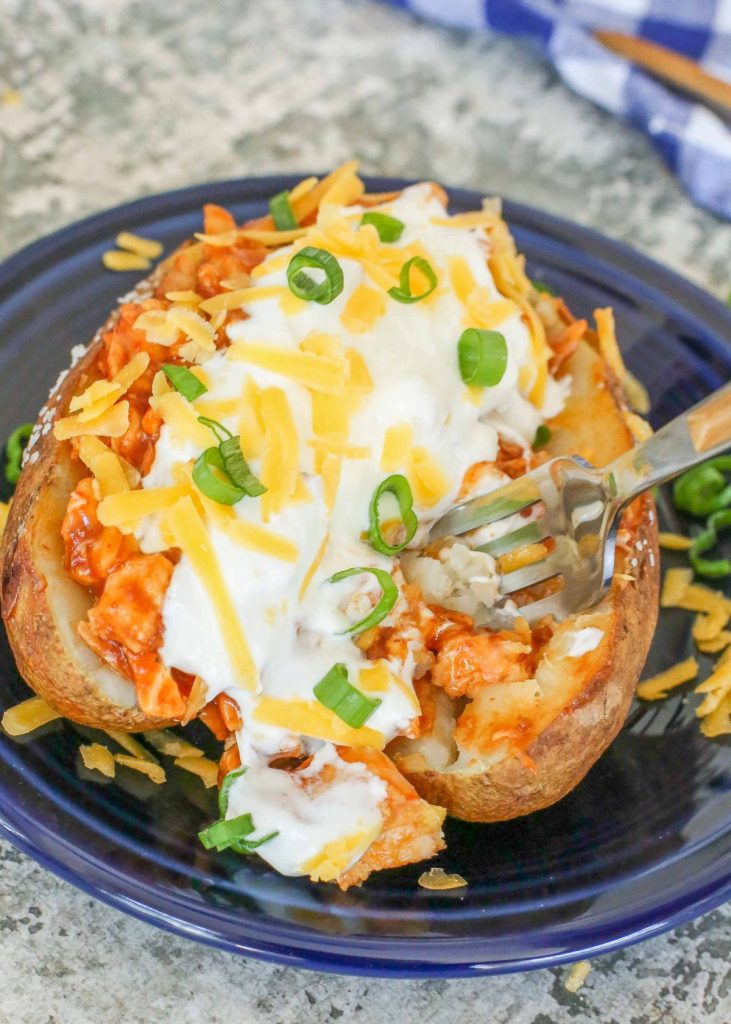 baked potato topped with BBQ chicken