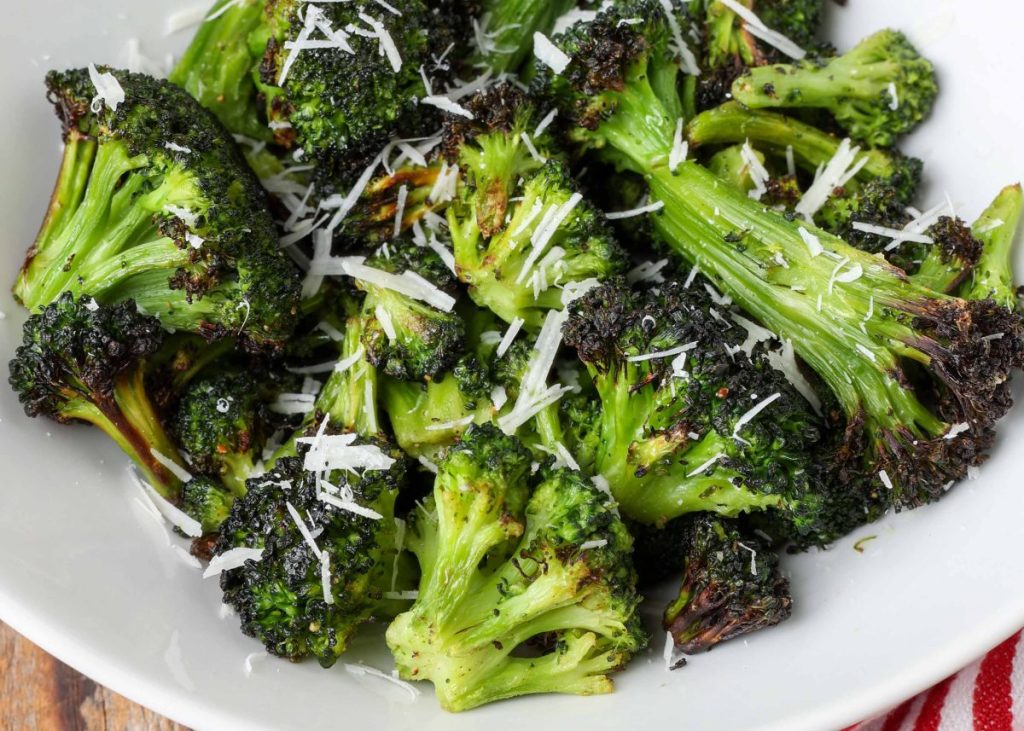 close up photo of air fried broccoli with Parmesan
