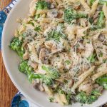 Mushroom Broccoli Pasta in white serving dish