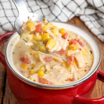 Creamy Corn Chicken Soup in red bowl