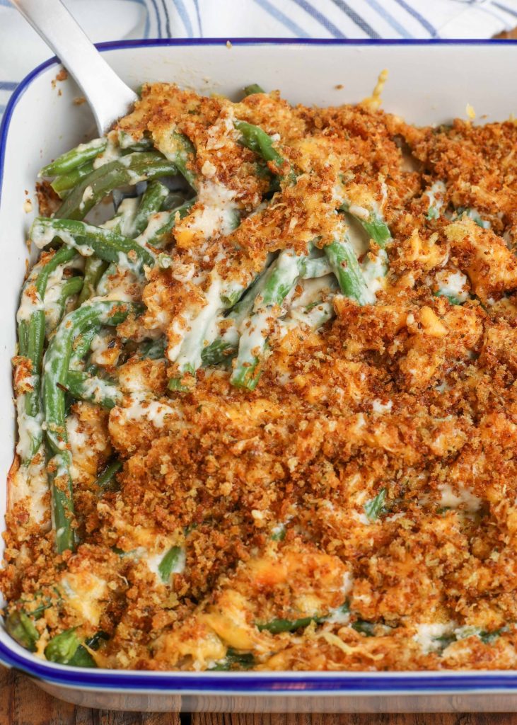 green beans au gratin in blue and white baking dish