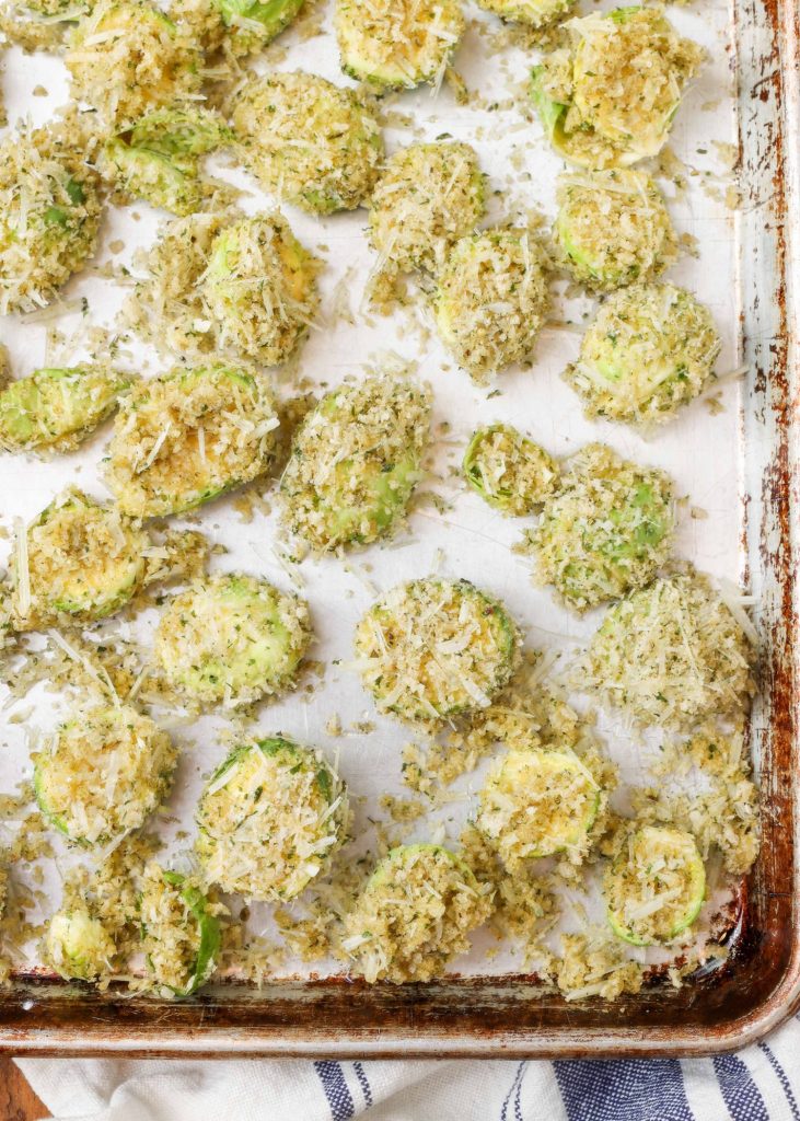 Parm Crusted Brussels Sprouts uncooked sprouts on baking sheet