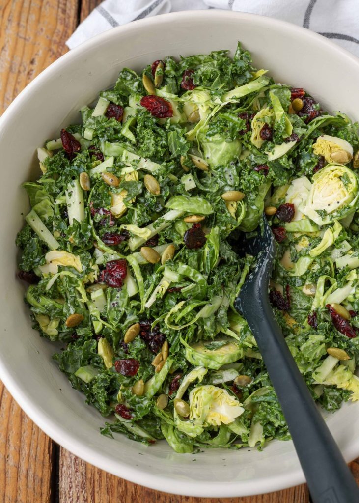 kale salad with Brussels, broccoli, cranberries, and pepitas with poppyseed dressing