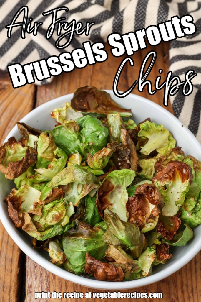 Air Fryer Brussels Sprouts Chips in white bowl with black and white linen