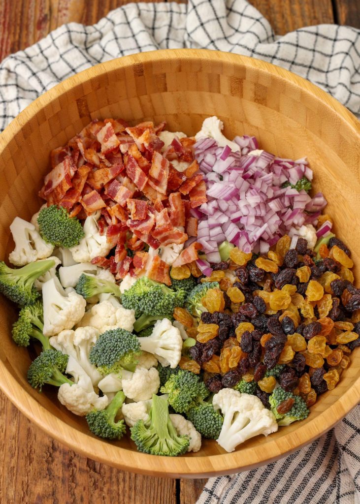 Broccoli Cauliflower Salad in wood bowl without dressing
