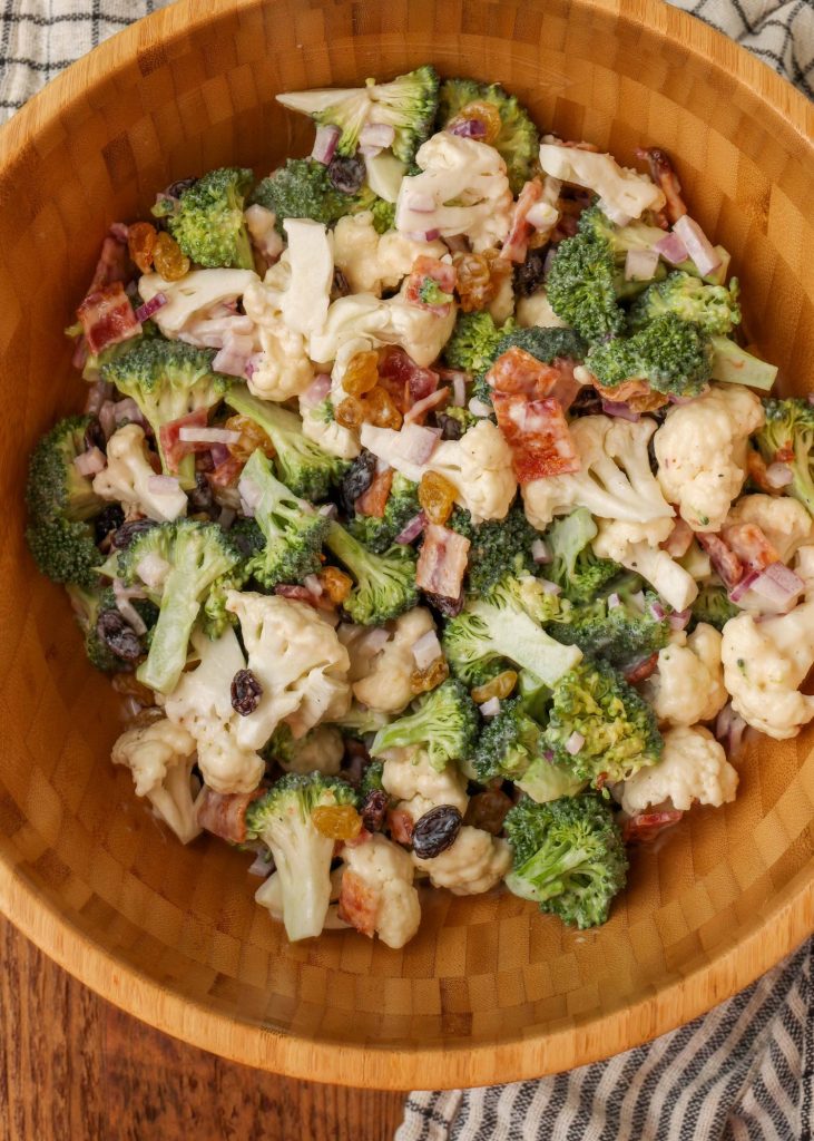 Broccoli Cauliflower Salad in wood bowl
