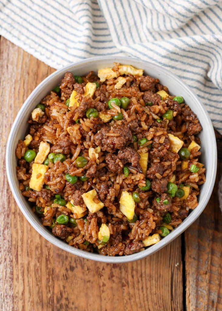 fried rice with eggs, peas, and ground beef