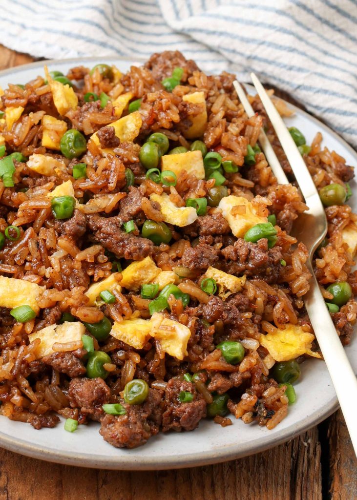 close up photo of fried rice with fork