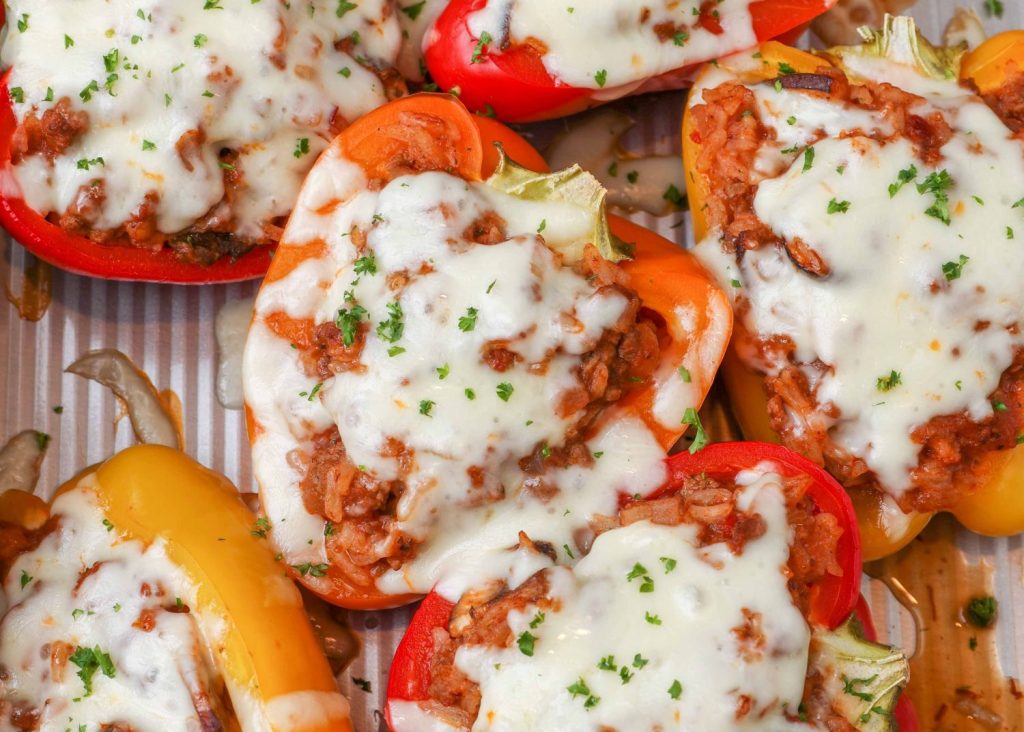 bell peppers stuffed with beef, rice, and cheese