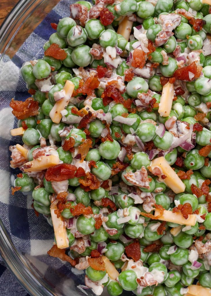 pea salad with bacon and cheese in bowl
