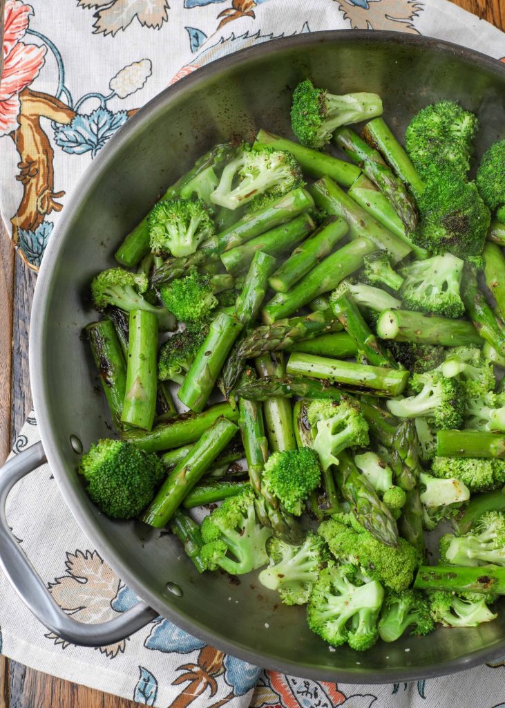 sauteed broccoli with asparagus in pan