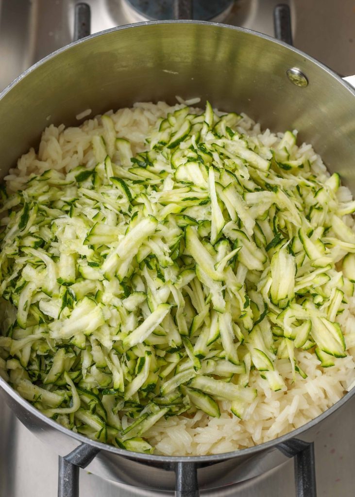 rice with zucchini in pot