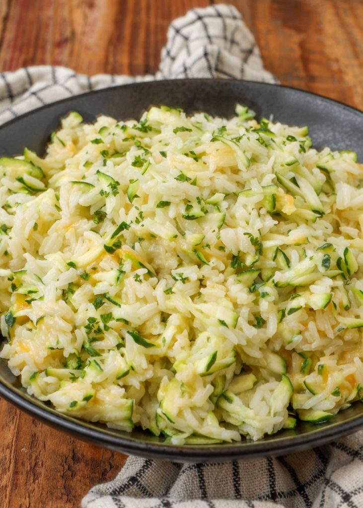 bowl filled with rice and shredded zucchini