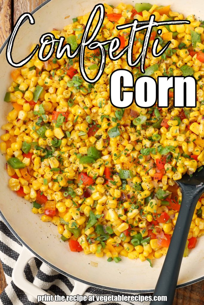 colorful confetti corn in a white bowl with a black spoon resting in it